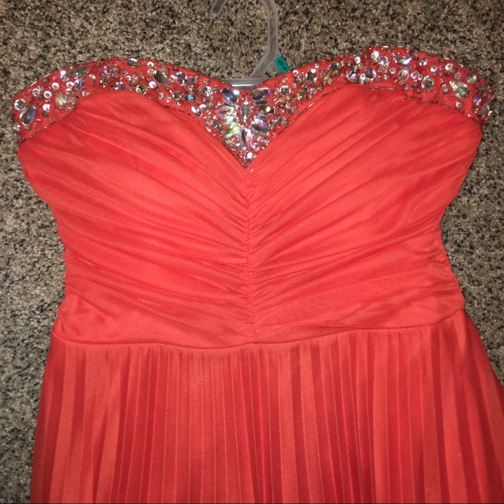 Orange strapless prom dress